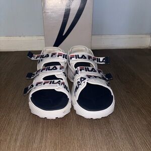 White and navy blue Fila sandals